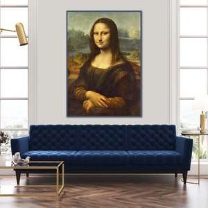May include: A framed reproduction of the famous Mona Lisa painting by Leonardo da Vinci. The painting features a woman with a soft smile and a dark background.