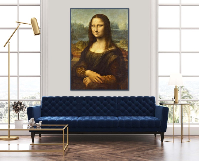 May include: A framed reproduction of the famous Mona Lisa painting by Leonardo da Vinci. The painting features a woman with a soft smile and a dark background.