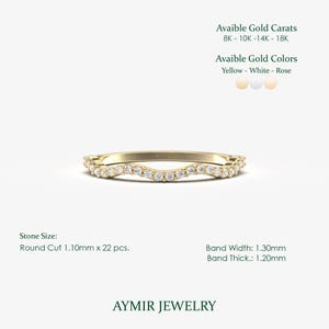 Close-up of 22 diamonds in twisted band formation, 1.10mm round stones following curved wave design in gold wedding band
