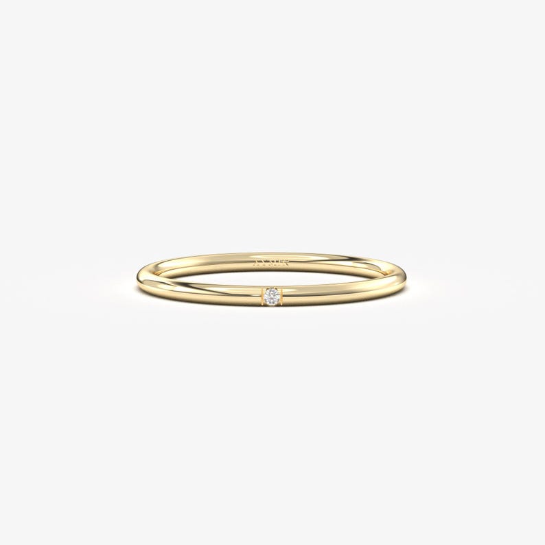 8K solid gold single diamond ring with minimalist design, delicate solitaire ring on white background