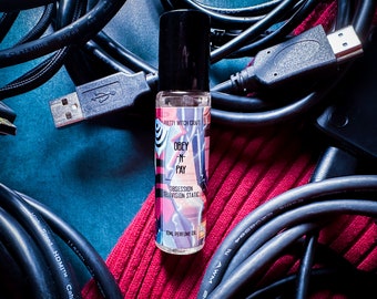 Vox Hazbin Hotel &quot;Obey N Pay&quot; Perfume Oil Roller Ball