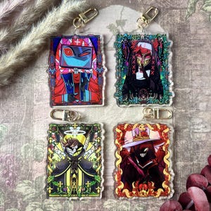 Hazbin Hotel Religious Corruption 3.5 Inch Doubled Sided Acrylic Keychains - Alastor Lucifer Vox and Adam