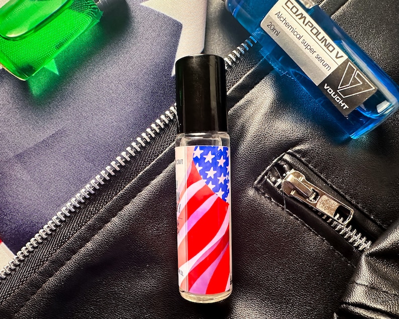 May include: A small glass bottle with a black cap and a label featuring an American flag design. The bottle is labeled "COMPOUND V Alchemical super serum 20ml VAUCHT".