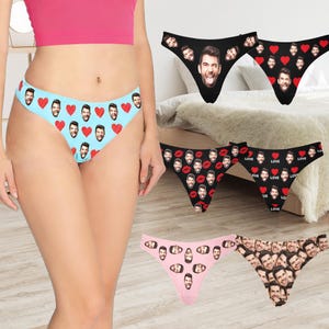 May include: A variety of underwear with custom face prints. Styles include light blue with red hearts and faces, black with faces and red hearts, black with faces and red lips, and pink with faces. The underwear is displayed on a model.