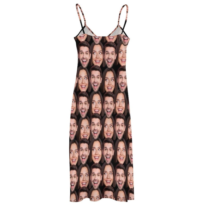 May include: A black sleeveless dress with a repeating pattern of faces. The faces are of a man and a woman, and they are all smiling.