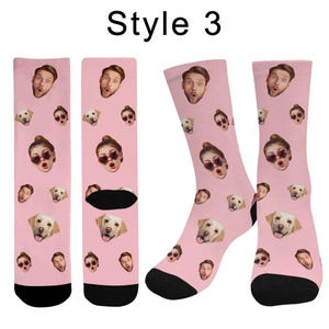 May include: Light pink crew socks featuring a repeating pattern of a man's face, a woman's face wearing heart-shaped sunglasses, and a golden retriever dog's face. The socks have black toe and heel sections. The text Style 3 appears at the top.