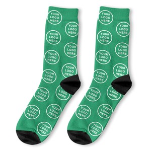 May include: A pair of green socks with a white circle pattern that says "YOUR LOGO HERE" repeated throughout the socks.