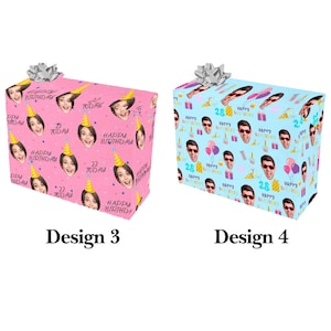 May include: Two wrapped gift boxes. One is pink with faces, party hats, and the words "Happy Birthday" and "Today". The other is light blue with faces, sunglasses, balloons, and the number "28". Both have silver bows.