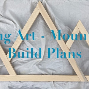 May include: Wooden frame for string art in the shape of three mountains. The text "String Art - Mountains Build Plans" is written in blue text on a white background.