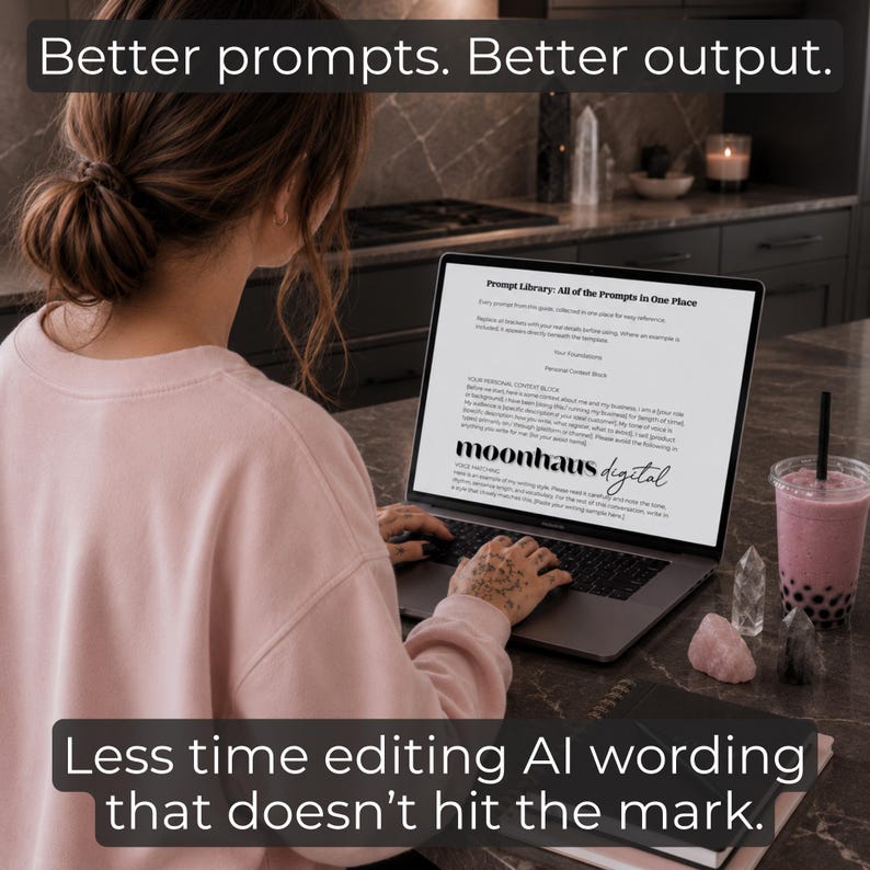 May include: A person using a laptop with the text "Better prompts. Better output." and "Less time editing AI wording that doesn't hit the mark." on the screen. The laptop displays "moonhaus digital" and a document. A drink and crystals are on the table.