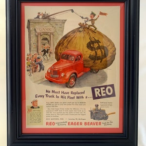 May include: A vintage advertisement for REO trucks featuring a cartoon illustration of a truck hauling a giant bag of money to a bank. The text reads "He Must Have Replaced Every Truck In His Fleet With a... REO".