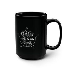 May include: Black ceramic mug with a white graphic that reads "CHICAGO CERTIFIED shit show COORDINATOR POLICE" inside a star shape. The mug has a large handle and a glossy finish.