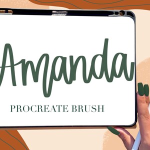 May include: A white tablet screen with the word "Amanda" written in a dark green cursive font. The text "PROCREATE BRUSH" is written below the name. A hand is holding a white stylus near the screen.