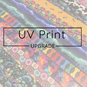 May include: A close-up of colorful patterned dog collars with the text "UV Print Upgrade".
