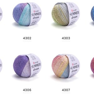 May include: Eight skeins of yarn in various colors, each with a label that reads "SUMMER dream". The yarn colors include shades of orange, blue, green, purple, and pink. Each skein has a unique color combination.