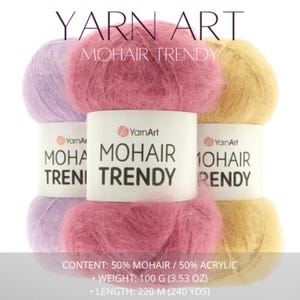 May include: Image of Yarn Art Mohair Trendy yarn in pink, lavender, and yellow. The fluffy yarn balls have labels with the brand name and product details. The label states the yarn is 100g. The text on the image reads: Mohair Trendy.