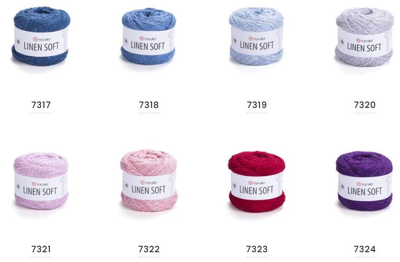 May include: Eight skeins of YarnArt Linen Soft yarn in various colors. The colors include shades of blue, gray, pink, red, and purple. Each skein has a white label with the text "LINEN SOFT" and a product number.