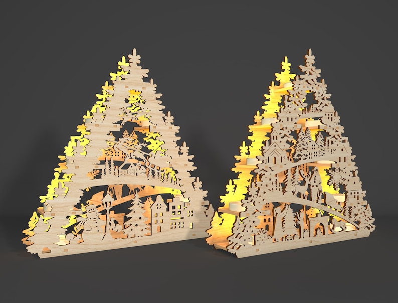 May include: Two wooden Christmas pyramid ornaments featuring intricate cutouts of a winter village scene. The pyramids are illuminated with warm white lights, creating a festive glow.