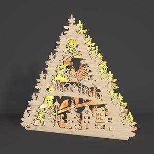 May include: A wooden Christmas tree silhouette with intricate cutouts of houses, trees, and a sleigh with reindeer. The tree is illuminated from behind, creating a warm glow.