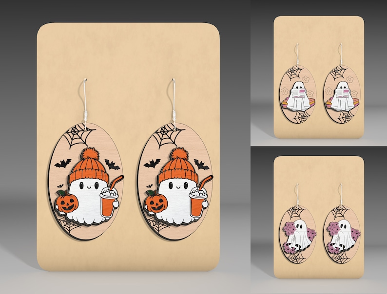 May include: Three pairs of Halloween-themed earrings featuring ghosts with different designs. The first pair features a ghost wearing a hat and holding a pumpkin and a drink. The second pair features a ghost reading a book. The third pair features two ghosts holding hands.