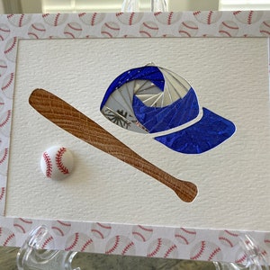 Cappello da baseball con mazza e palla