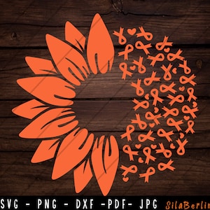 Peut inclure: Tournesol orange avec un cercle de rubans orange de sensibilisation autour. Les rubans sont noués en un nœud et ont un petit cœur au centre de chaque nœud.