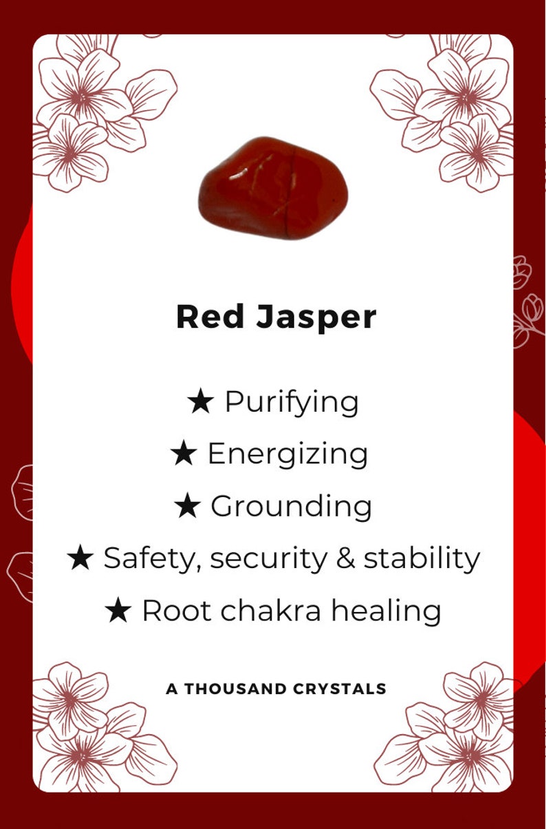 May include: Red jasper crystal with a star symbol and the text "Red Jasper" and "A Thousand Crystals". The crystal is known for its purifying, energizing, grounding, safety, security, and stability properties. It is also used for root chakra healing.