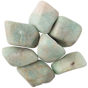 May include: A collection of six smooth, light green and white tumbled stones. The stones are various sizes and shapes, with a natural, polished finish.