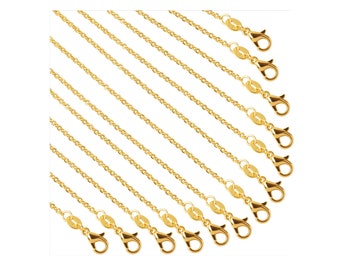 May include: A set of 10 gold-coloured chain necklaces with lobster claw clasps. The chains are arranged in a diagonal pattern.