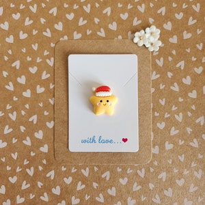 Étoile de Noël à pochettes | Mini cadeau câlin de poche | Joli souvenir festif | Petit cadeau boîte aux lettres | Jeton câlin étoile de Noël | Remplisseur de bas
