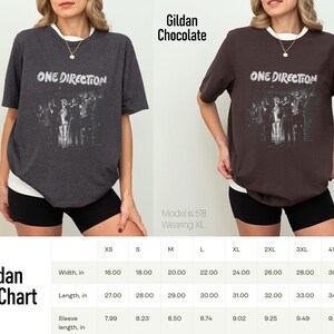 May include: Dark heather and chocolate-colored t-shirts with the text "ONE DIRECTION" and a band image. The shirts have a white collar and are modeled by a person wearing black shorts. A size chart is also included.