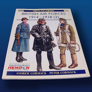 May include: Book cover featuring illustrations of three people in British Air Force uniforms from World War I. The book title is "British Air Forces 1914-1918 (2)" and the authors are Andrew Cormack and Peter Cormack.