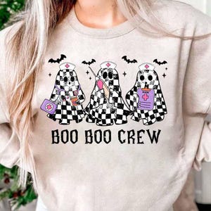 チェック柄ハロウィンナースシャツ、ブーブークルーナースシャツ、不気味なナースシャツ、ゴーストナースシャツ、ピキュER RN ICUナースへのハロウィンギフト