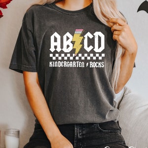 ABCD Kinder Rocks T-Shirt Funny Teacher Gift Tee Shirt ABCD Kinder Rocks T-Shirt Funny Teacher Gift Tee Shirt