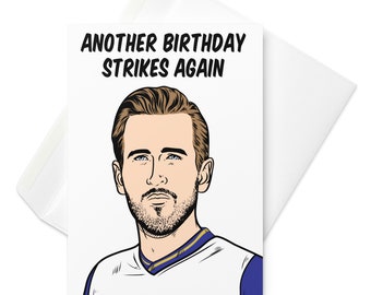 Può includere: Un biglietto di auguri per il compleanno con un'illustrazione a cartoni animati di Ryan Reynolds con il testo "Another birthday strikes again".