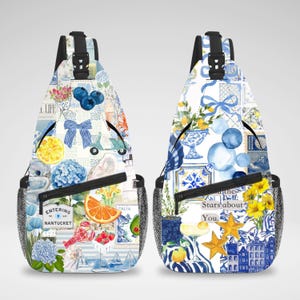 May include: Two sling backpacks featuring a collage of watercolor illustrations in blue, white, and yellow. The left bag displays a Nantucket sign, blueberries, and a lobster. The right bag features yellow flowers, stars, and text reading "told the Stars about You."