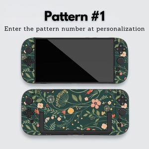May include: Two game console skins with a dark green floral pattern. The skins feature a design of flowers and leaves in shades of pink, yellow, and white. The text "Pattern #1" and "Enter the pattern number at personalization" are displayed at the top.