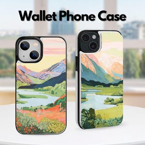 May include: Two wallet phone cases featuring a colorful landscape illustration of mountains, a winding river, and lush green fields. The design includes shades of orange, pink, blue, and green. The text Wallet Phone Case is printed at the top.