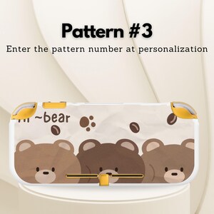 May include: A white and yellow patterned case for a handheld gaming device. The case features a repeating pattern of brown bear faces and coffee bean shapes. The text "Pattern #3" and "Enter the pattern number at personalization" are visible.