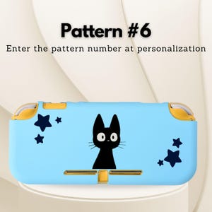 May include: A light blue game console case featuring a black cat illustration and dark blue star accents. The text "Pattern #6" and "Enter the pattern number at personalization" are displayed on the case.