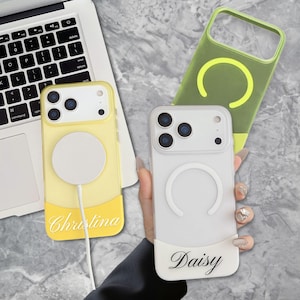May include: Three phone cases in yellow, white, and green. The yellow case has a white charging disc and the name "Christina" in script. The white case has the name "Daisy" in script. The green case is empty.