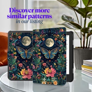 May include: A black e-reader with a colorful cover featuring a full moon, a blue butterfly, and various flowers. The text "Discover more similar patterns in our listing" is displayed in purple.