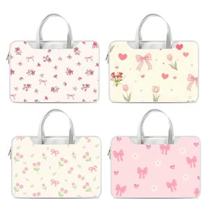 May include: Four laptop cases with floral and bow patterns. The cases feature a white background with pink flowers and bows. Each case has a white handle and zip. One case has pink roses, another has tulips and hearts, and the other two have bows and flowers.