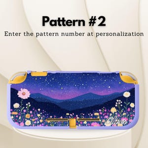 May include: A lavender and yellow Nintendo Switch case with a floral and mountain design. The case features a starry night sky, mountains, and colorful flowers. Text on the case reads "Pattern #2" and "Oliver's".