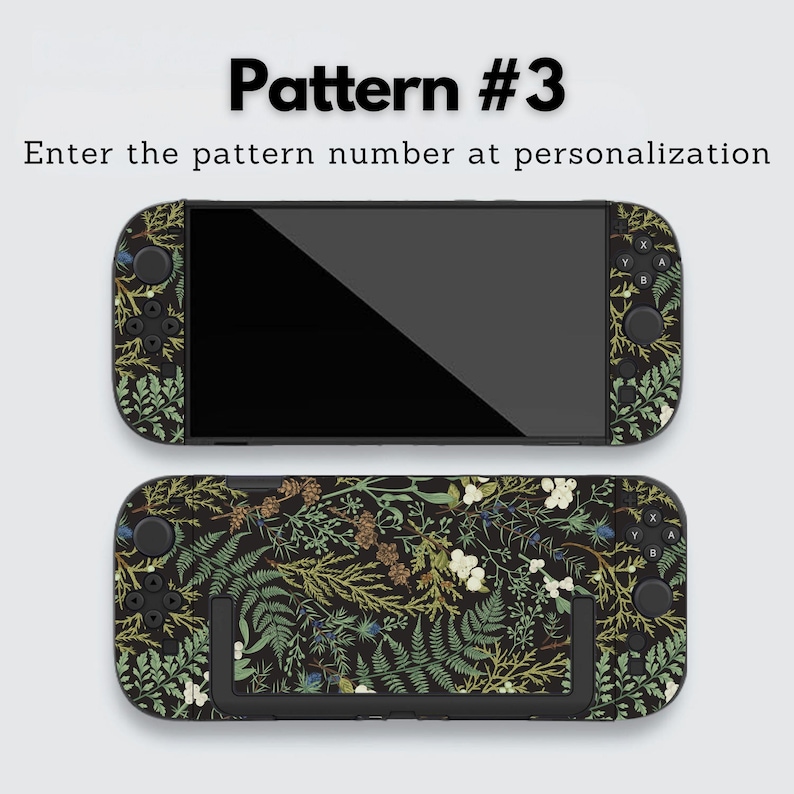 May include: Two black handheld gaming console skins with a botanical pattern featuring green ferns, white flowers, and brown accents. The text "Pattern #3" and "Enter the pattern number at personalization" are displayed at the top.