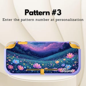May include: A lavender-colored game console case featuring a vibrant floral landscape design. The case has a colorful meadow scene with pink, blue, and yellow flowers under a purple and blue sky. The text "Pattern #3" is at the top.