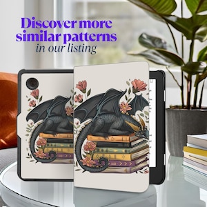 May include: A cream-coloured tablet case featuring a black dragon illustration on a stack of books with pink flowers. The case is open, revealing the tablet screen. Text on the case reads, "Discover more similar patterns in our listing."