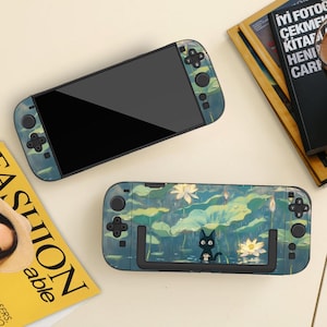 Funda con diseño floral de gatito negro para Nintendo Switch 2/Switch, carcasa protectora acoplable, antiarañazos y con absorción de impactos.