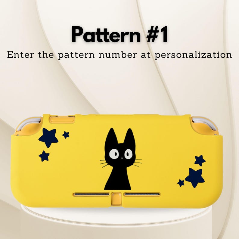 May include: Yellow handheld gaming console case with a black cat illustration and dark blue star accents. The text "Pattern #1" and "Enter the pattern number at personalization" are displayed on the image.