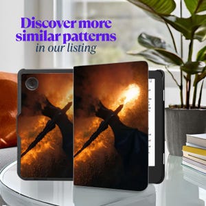 May include: A black tablet case and e-reader with a fiery dragon design. The image shows a dragon breathing fire against a backdrop of orange and yellow flames. Text on the image reads "Discover more similar patterns in our listing."